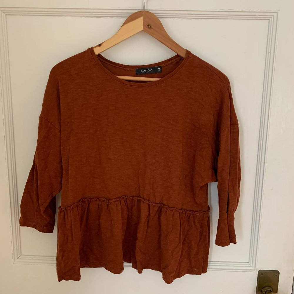 Orange peplum top
